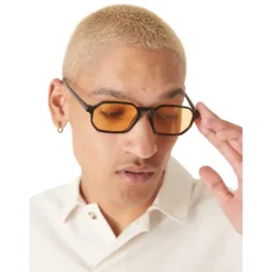 ASOS DESIGN round sunglasses with black frame and amber lens